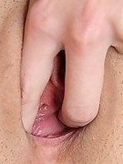 Nurse in red pantyhose stretching vagina wide with a vaginal speculum