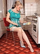 Sexy Housewife in stockings and blue shoes