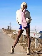 MILF in sexy pantyhose and heels offers sex for money on the road