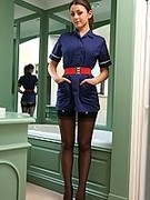 Sexy nurse in stockings and high heels gets wet in the bathtub after stripping out of her nurse uniform.