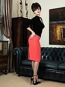 Kate Anne in retro seamed stockings and high heels slowly stripping