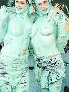 Two naughty slutty babes getting messy with lots of paint