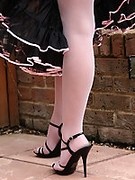 Mature in High Heels and Pantyhose In The Garden
