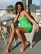 MILF in pantyhose  is sexy in the sun